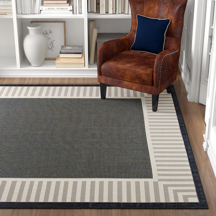 Three Posts™ Delshire Flatweave Indoor / Outdoor Area Rug in Black